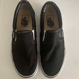Black slip-on Vans